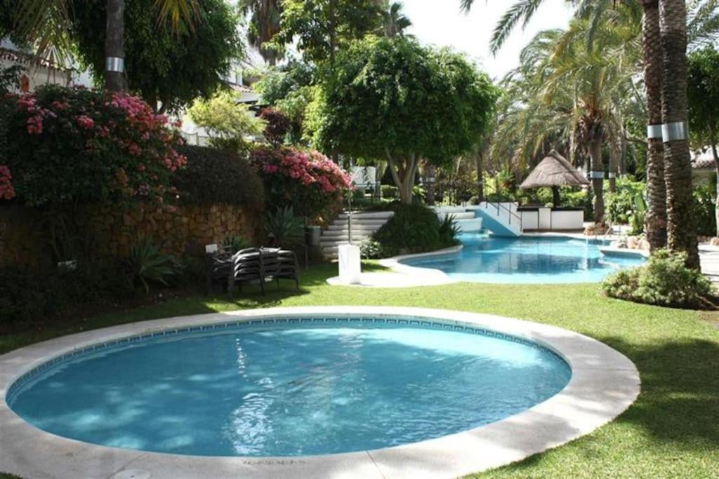 Apartamento Beachfront Development With Tropical Gardens.
